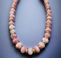 Melon Pink Gemstone Necklace with Gold Accents